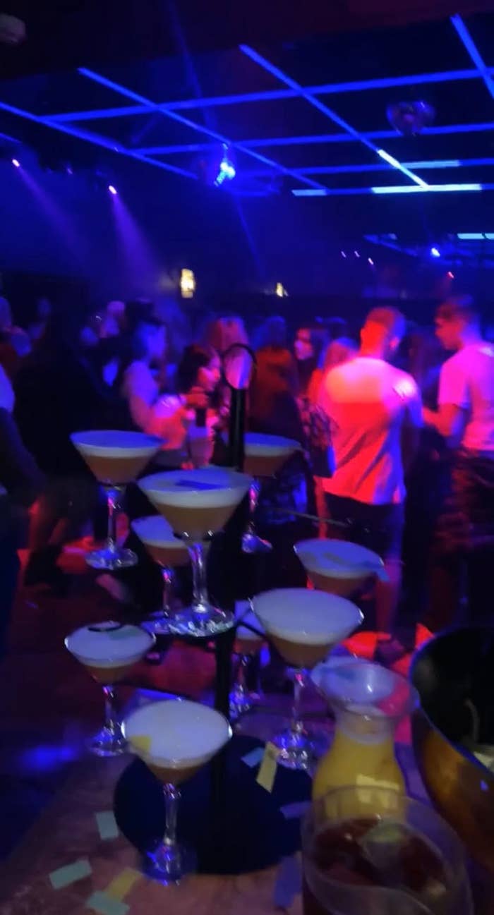 Cocktails on a table in a dark club environment