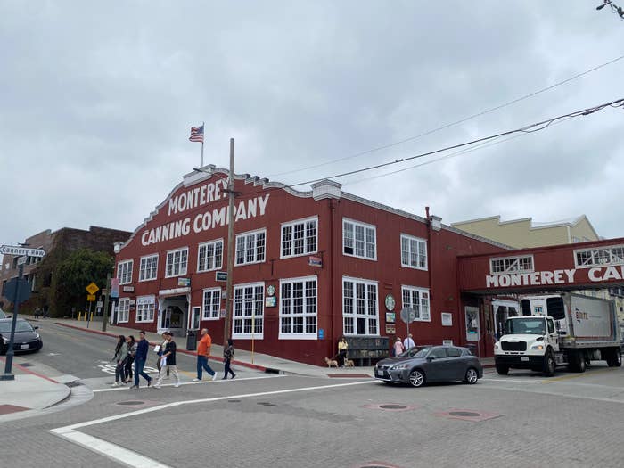 Looking at the Monterey Canning Company building from across the street