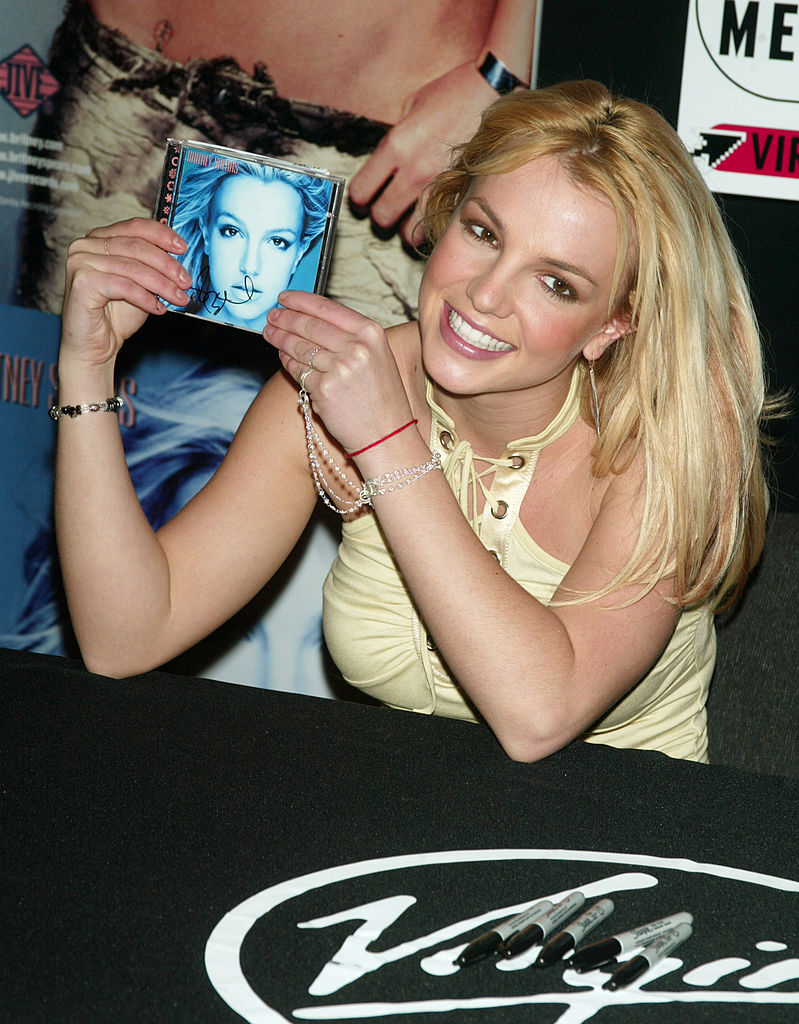 Britney Spears holding her CD
