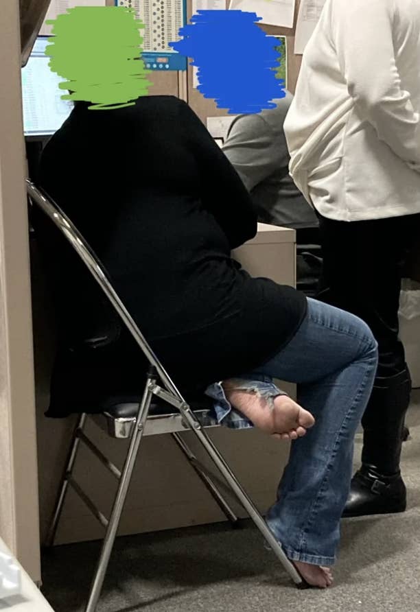 a person in an office with no shoes on