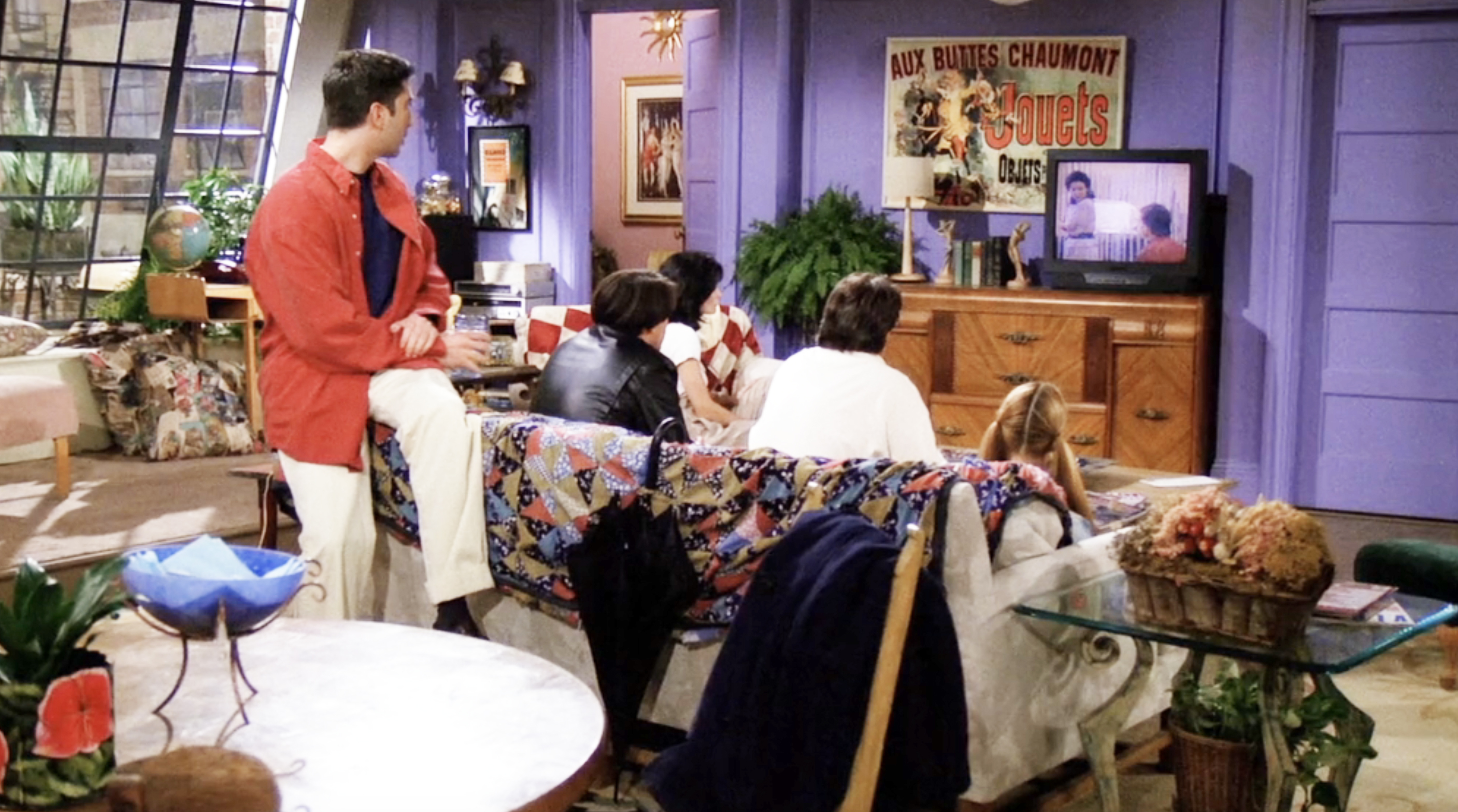 the friends hanging in the purple apartment