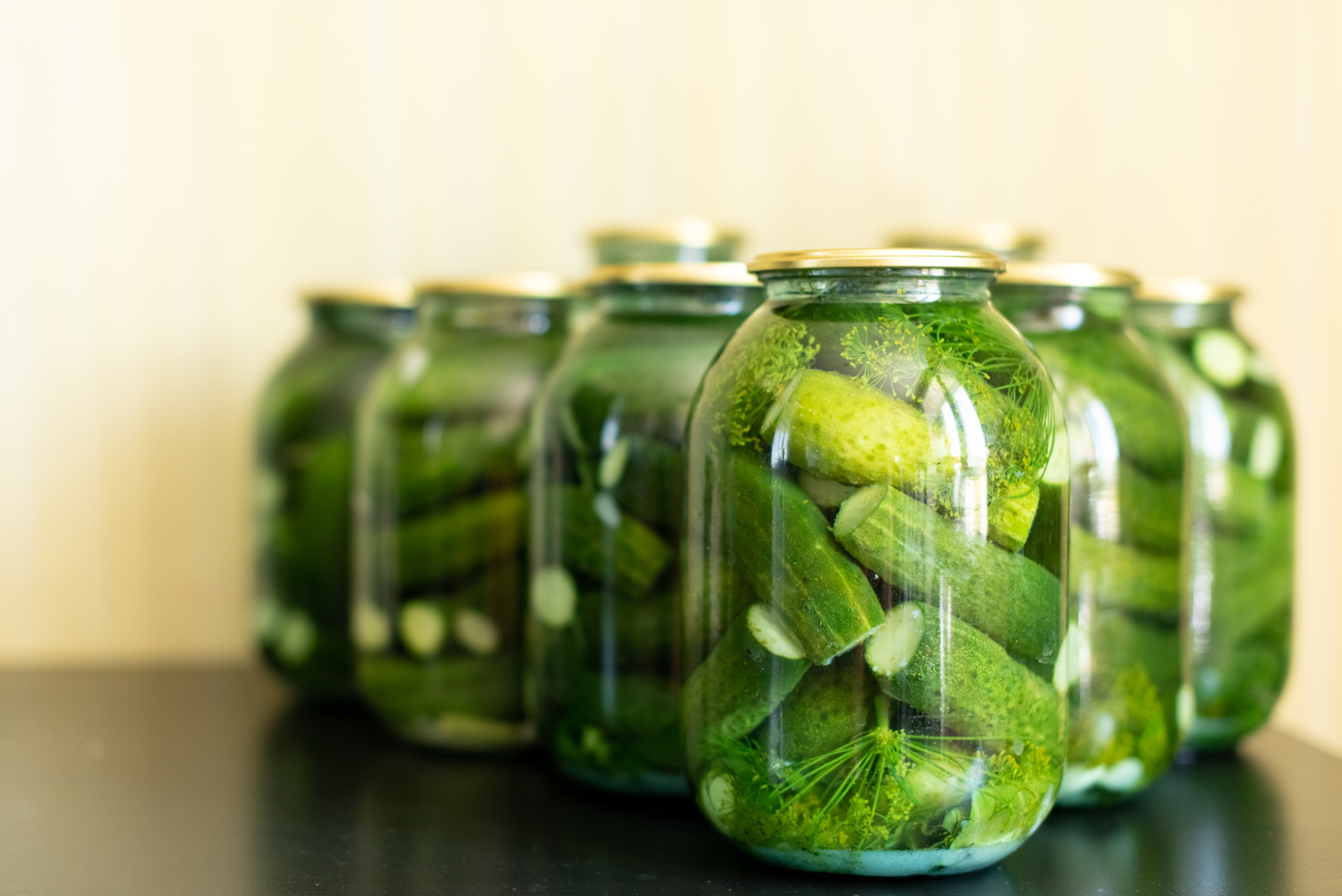 pickled cucumbers in glass jars