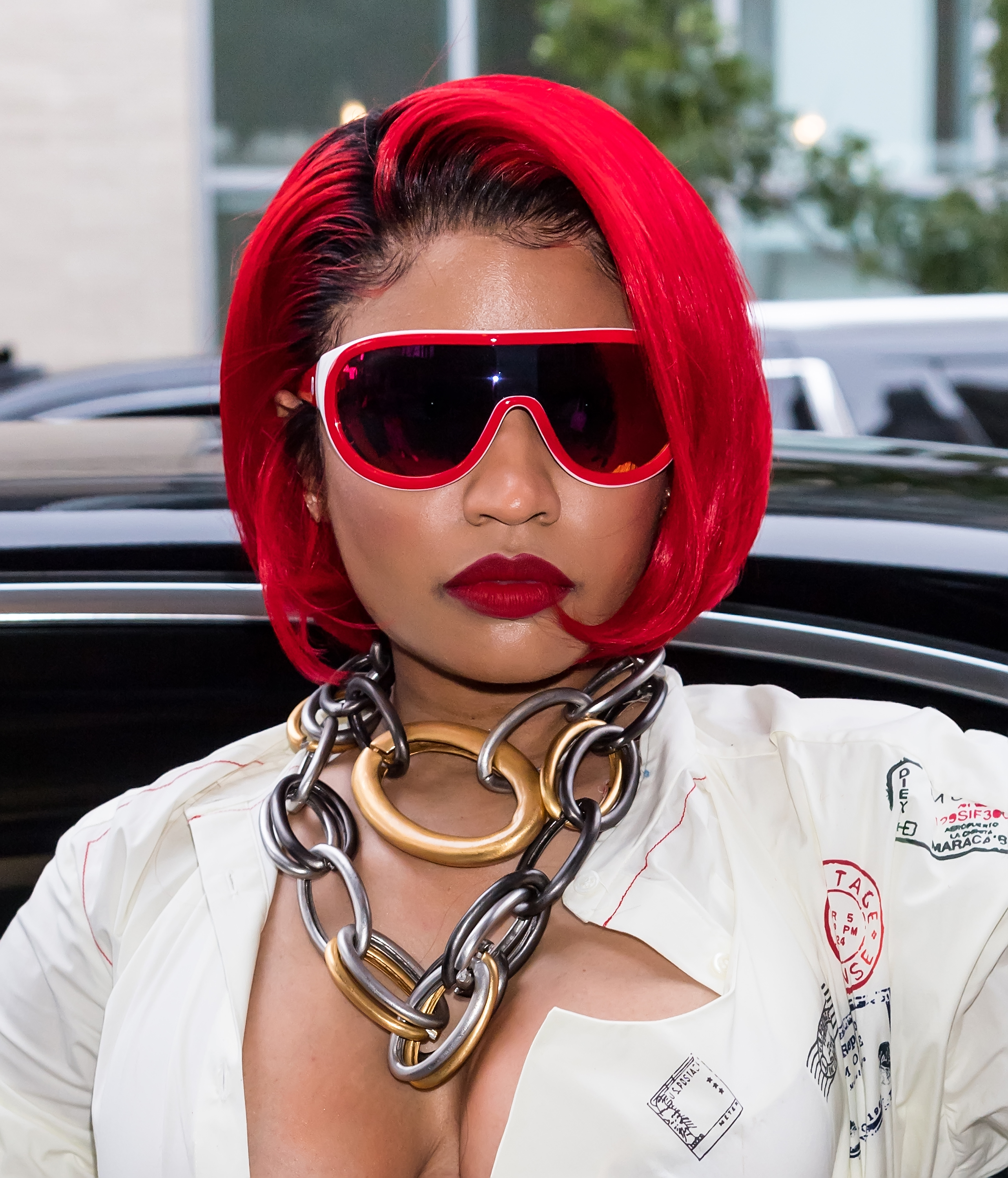 Close-up of Nicki in a thick chain-link necklace