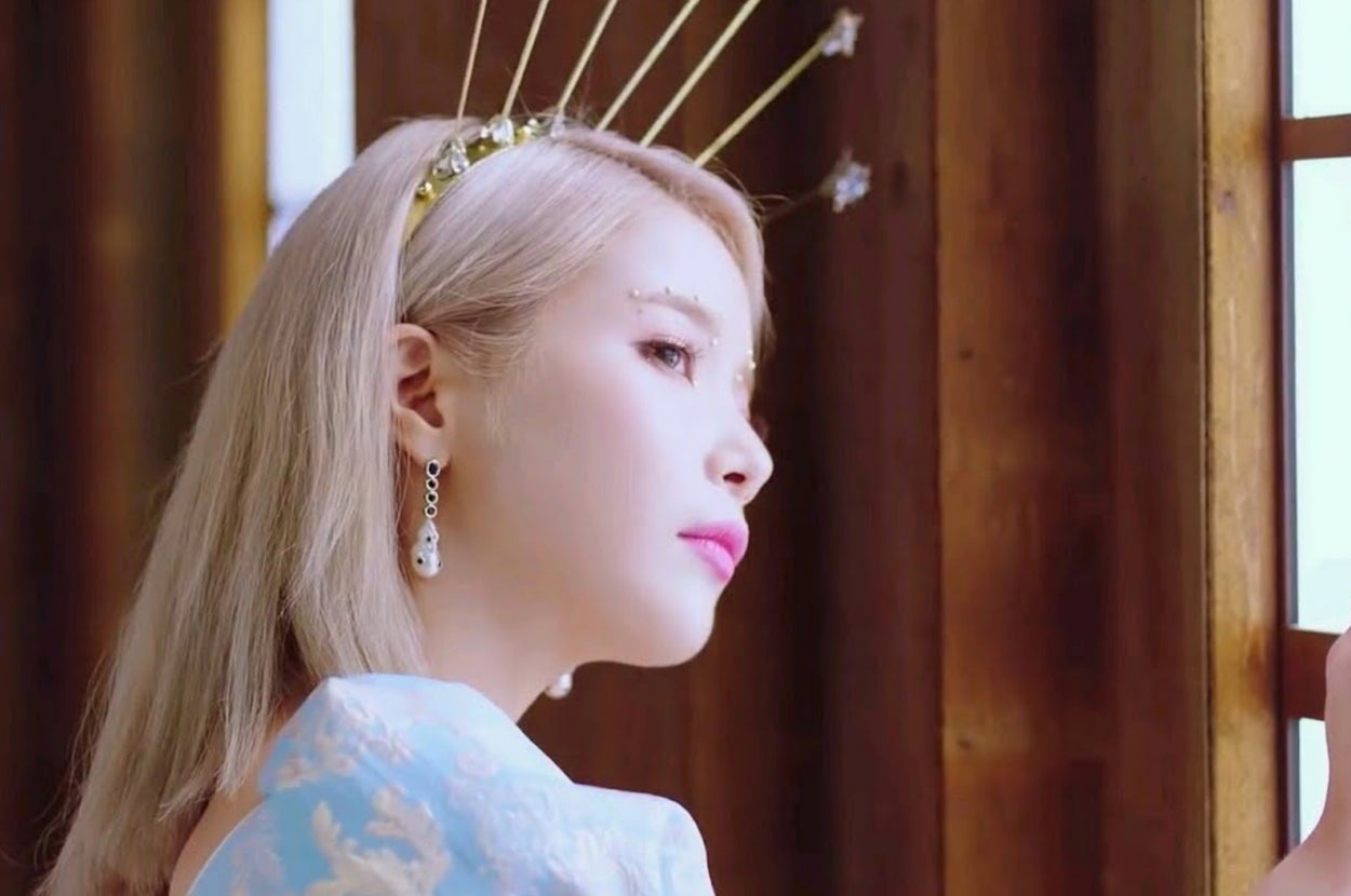 Mamamoo singer looks out a window