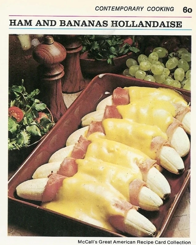 a vintage recipe card with an image of whole bananas wrapped in ham and covered in hollandaise