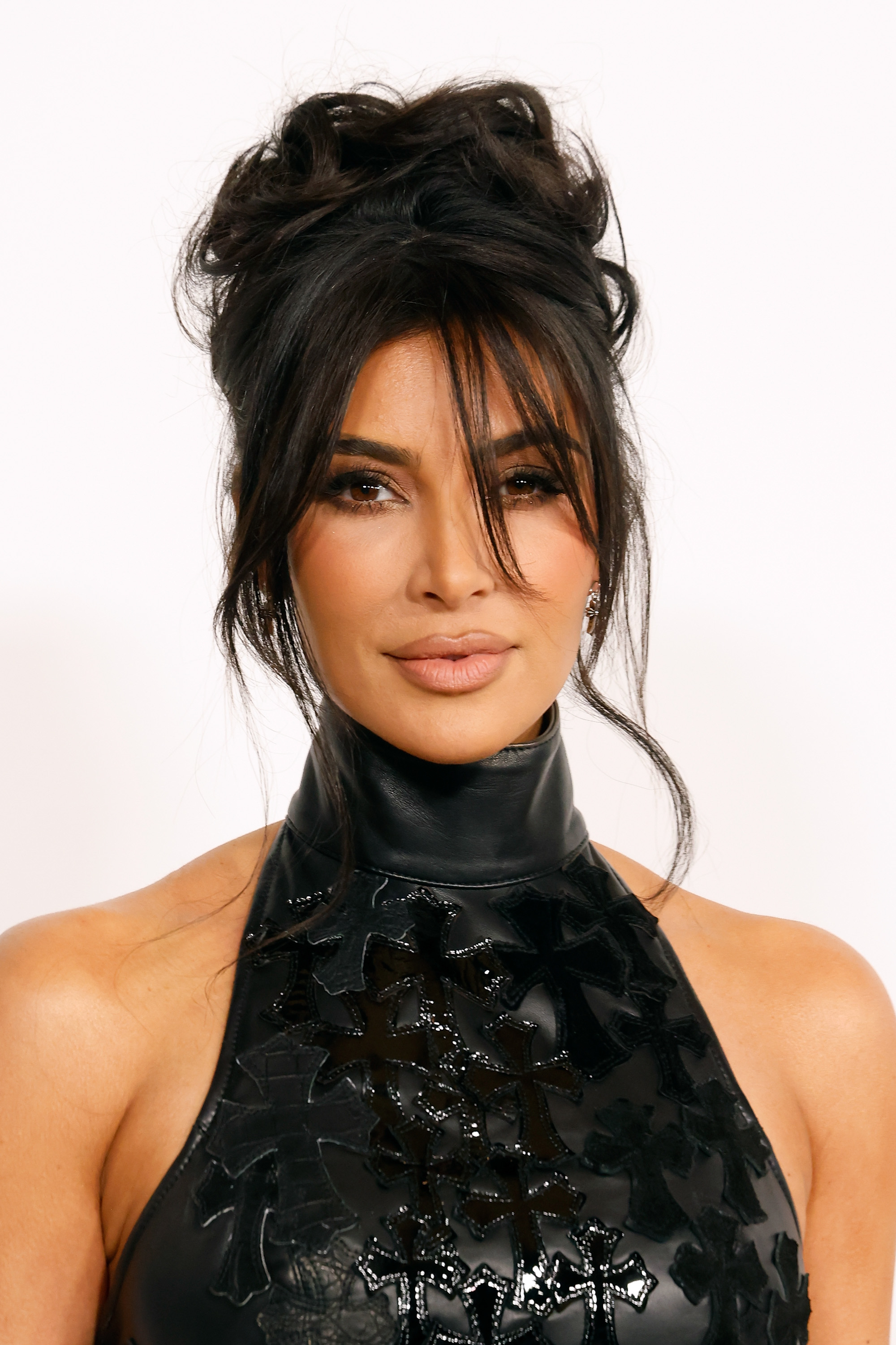 Close-up of Kim wearing a halter top