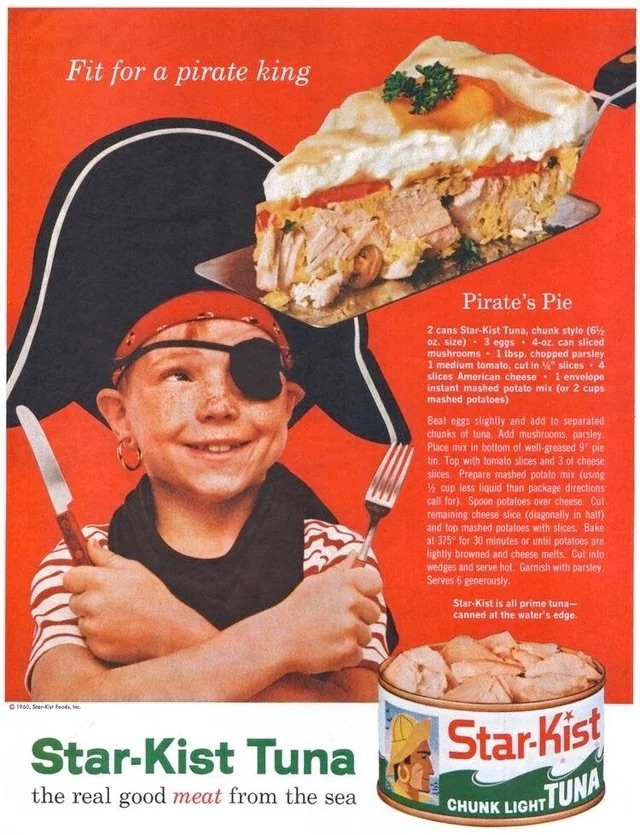a recipe card for pirate&#x27;s pie with an image of a child with a pirate hat and a slice of &quot;pie&quot; with canned tuna in the center