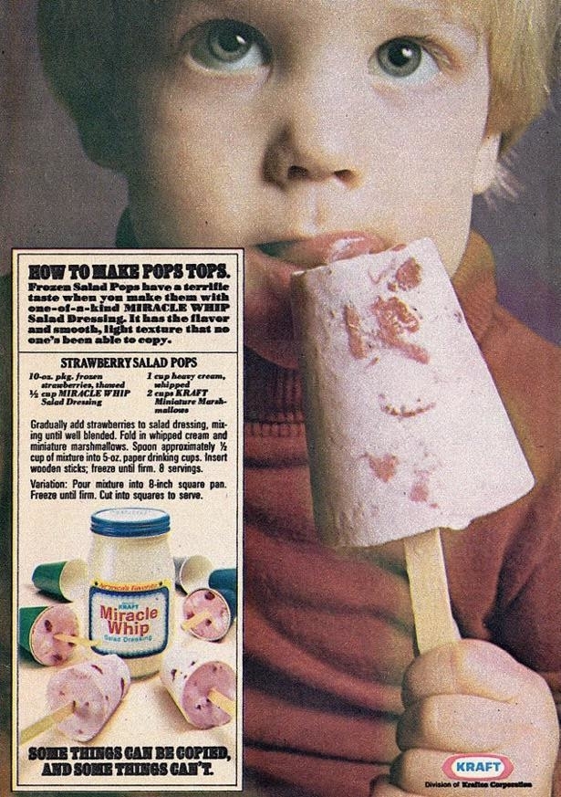 a recipe card for strawberry salad pops with an image of a child licking a cone-shaped pink popsicle