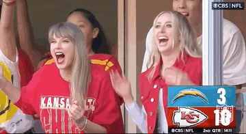 taylor swift and brittany mahomes clapping and cheering at a football game