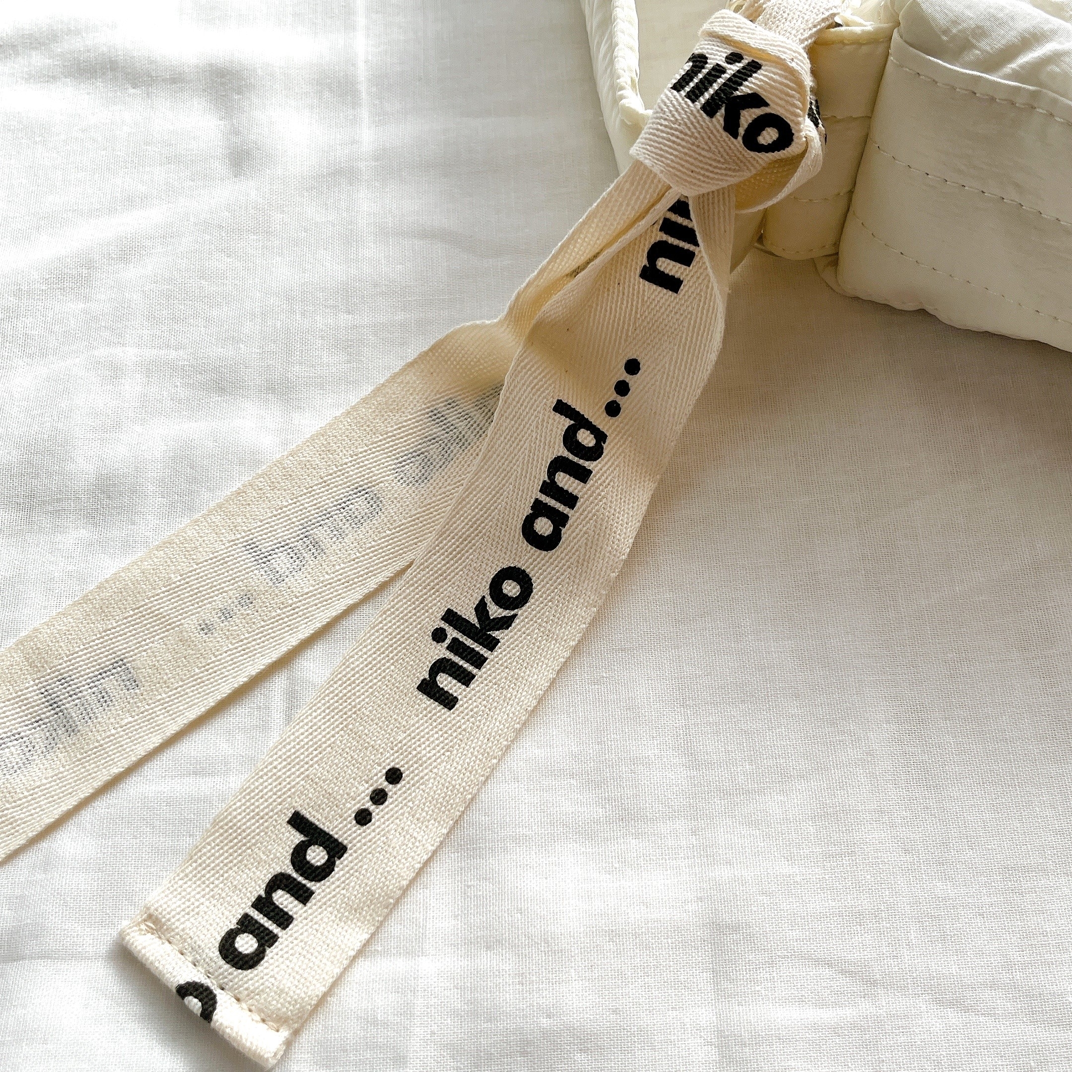 ニコアンドのオススメのバッグ「オリジナルロゴキルトショルダーバッグ」