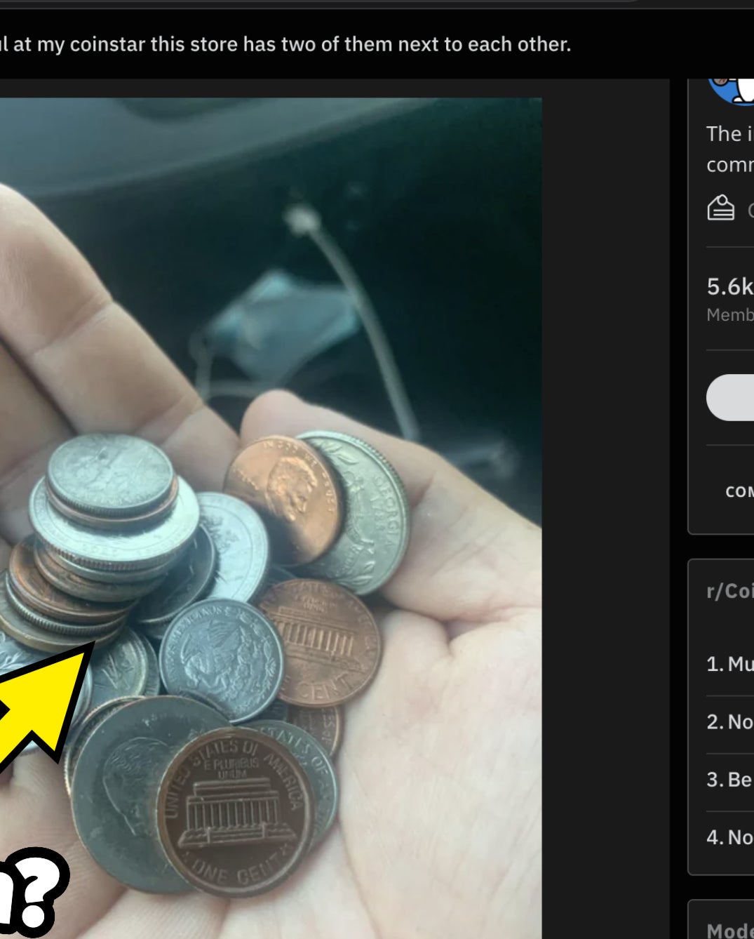 A person is holding a handful of change