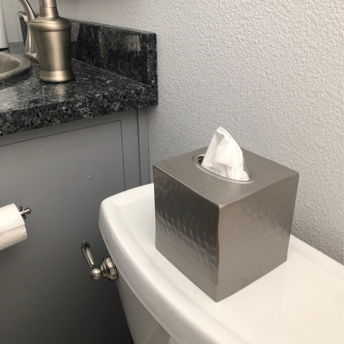 the silver tissue cover box in a reviewer&#x27;s bathroom