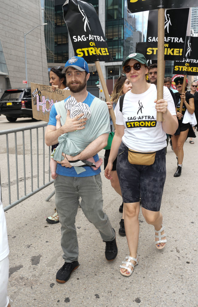 Daniel and Erin with their baby on the SAG-AFTRA picket line