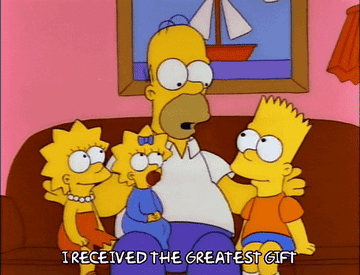Homer Simpson sitting down with his children saying, &quot;I received the greatest gift.&quot;