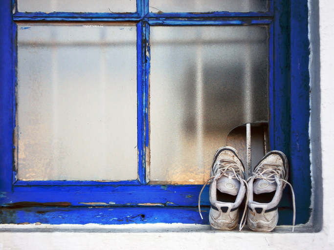 shoes left on a window sill
