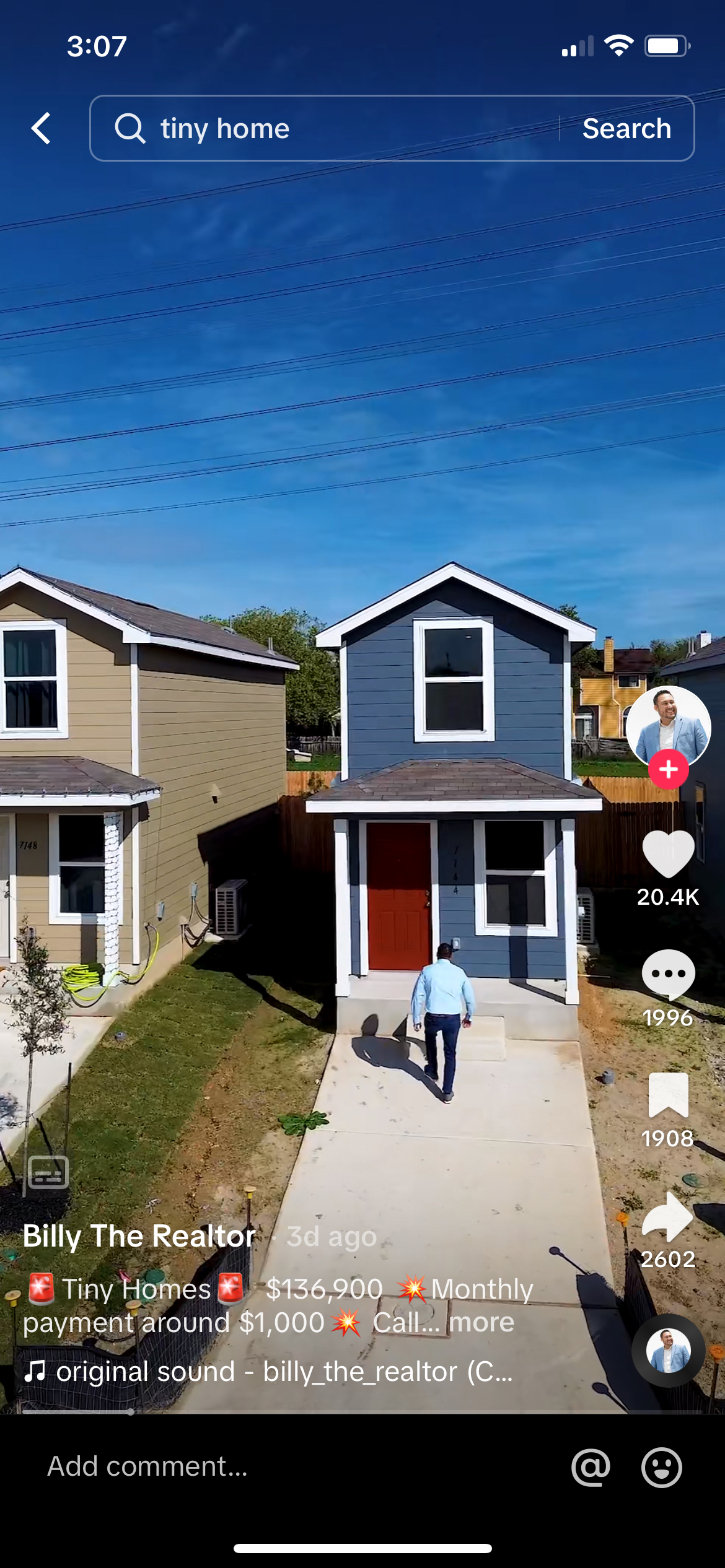 Billy walking into the tiny house