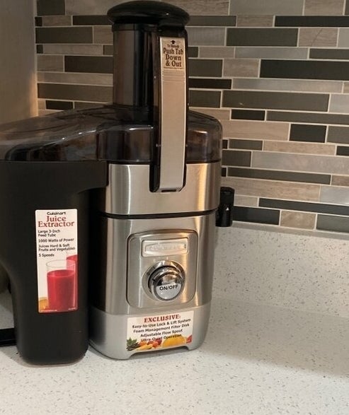 The juice extractor on a kitchen counter