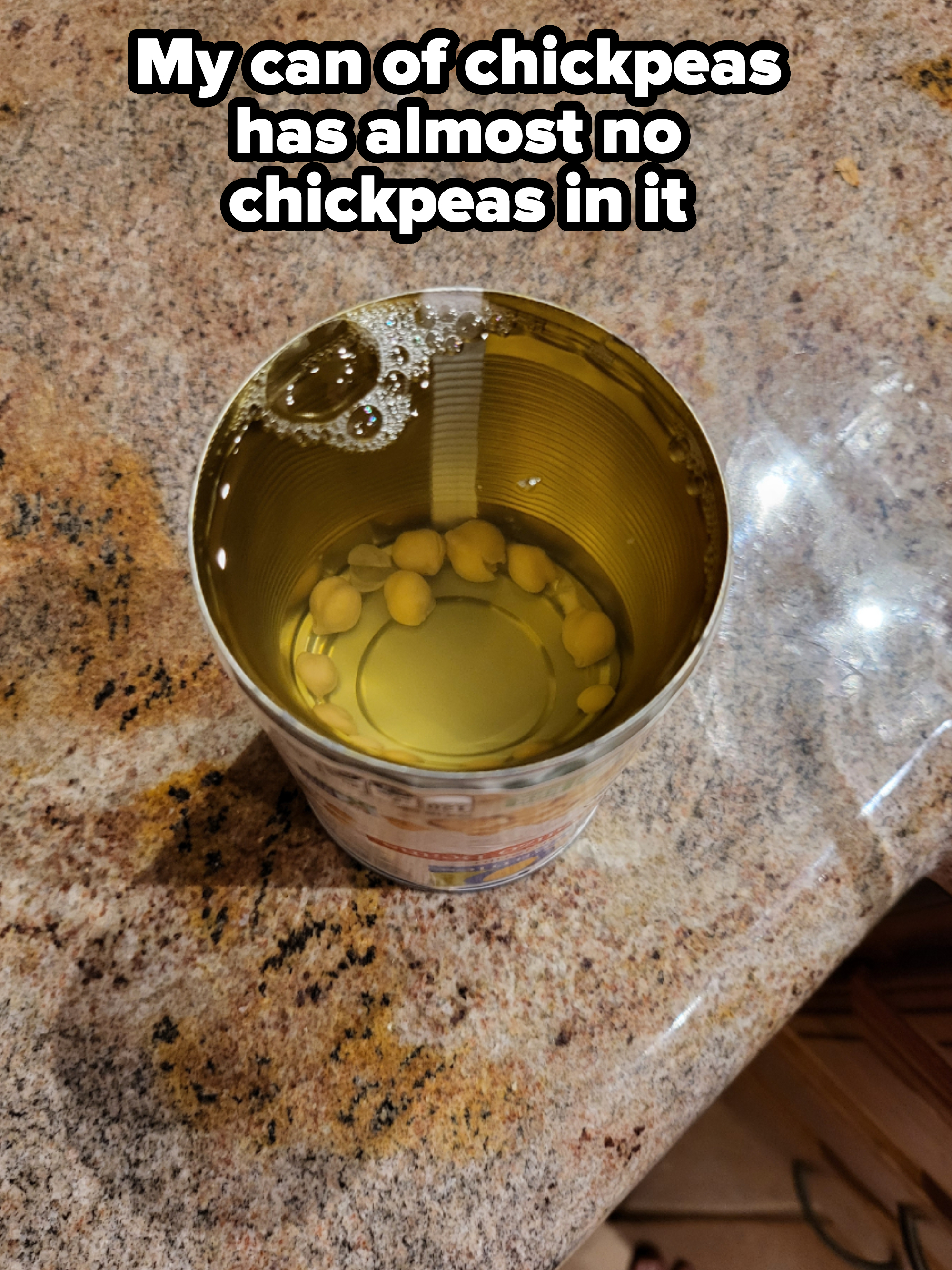 a can of chickpeas with barely any chickpeas