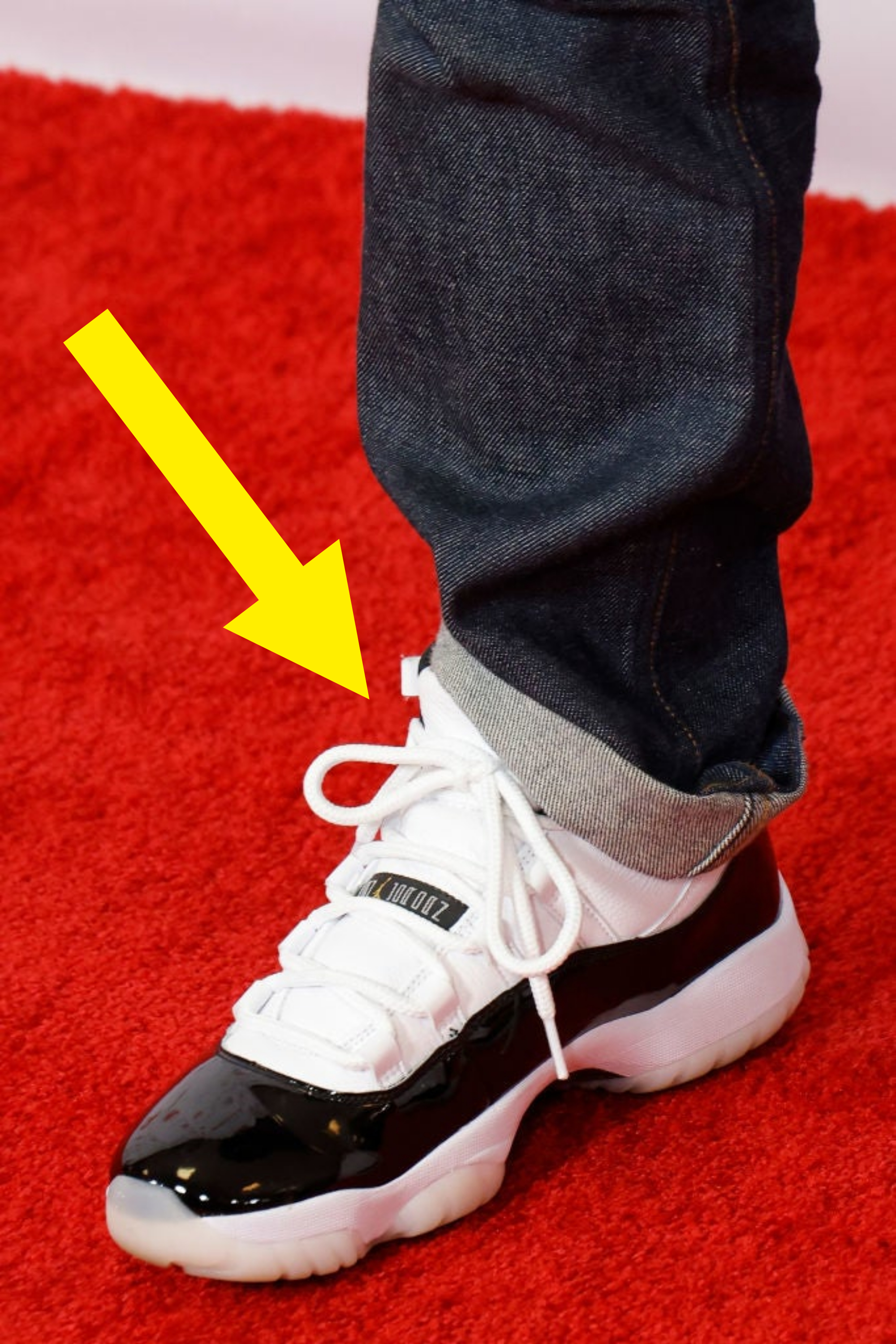 Closeup of Andy Cohen&#x27;s jeans and shoes