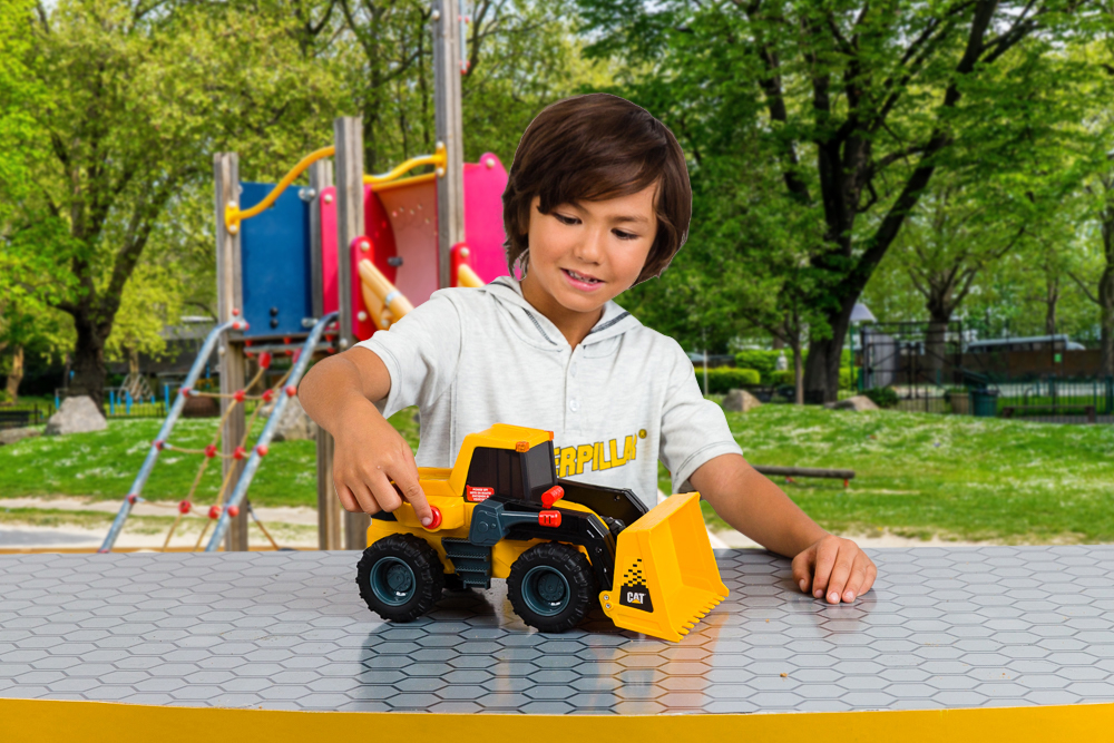 a child playing with the 2.0 wheel loader