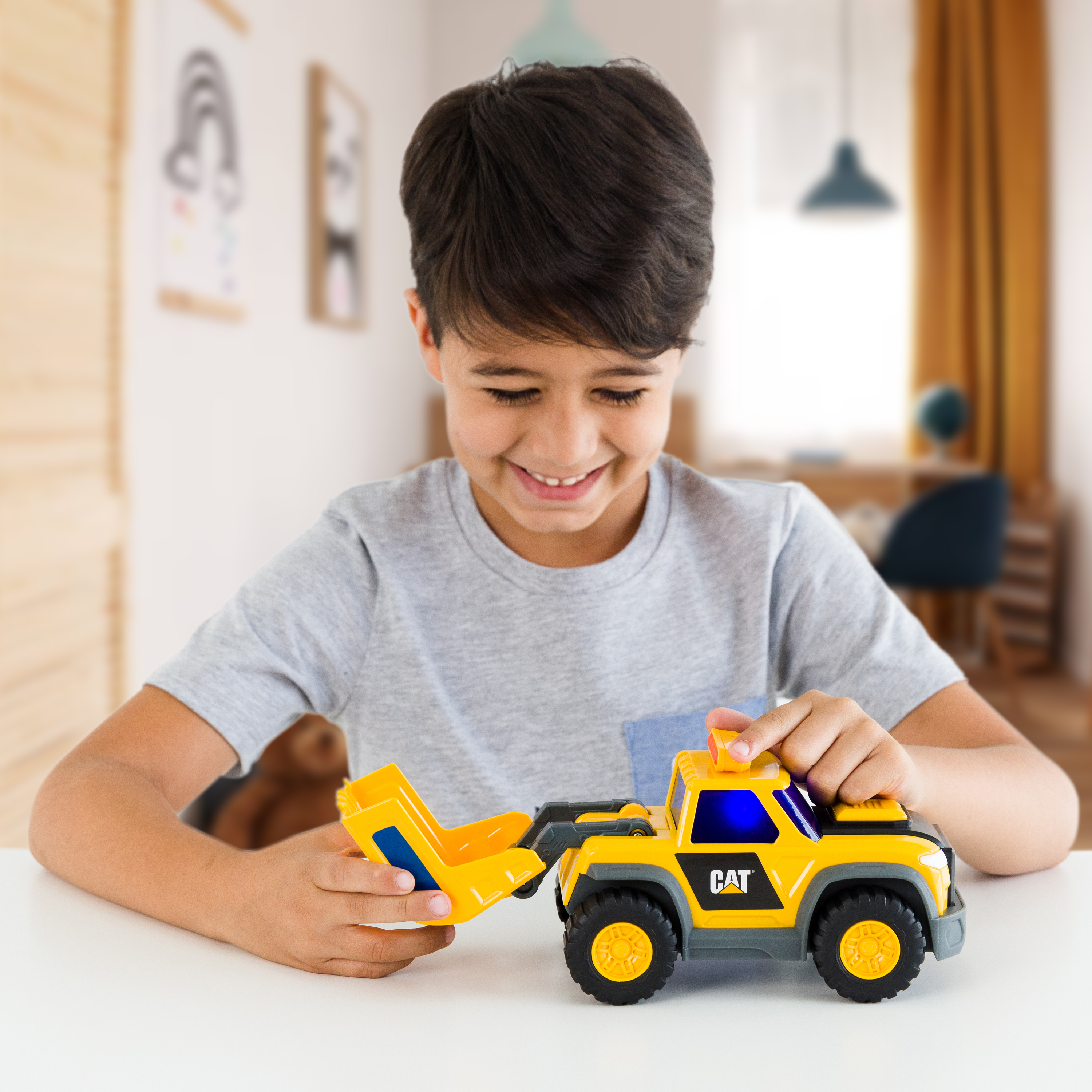 a child transforming the SUV into a wheel loader