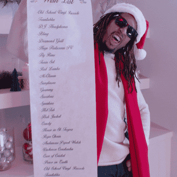 Lil Jon holding a Christmas list.