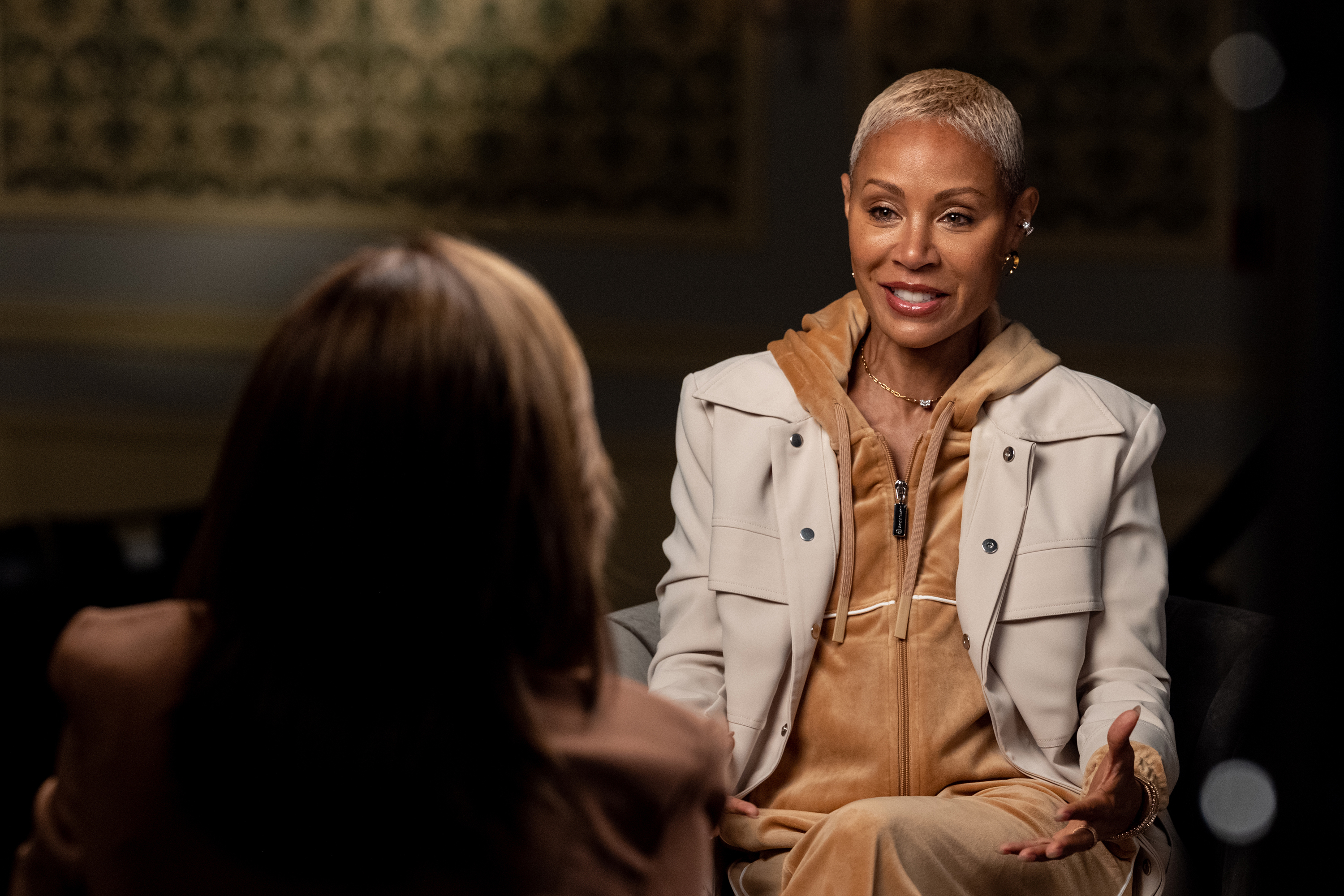 Jada smiling as she sits for an interview