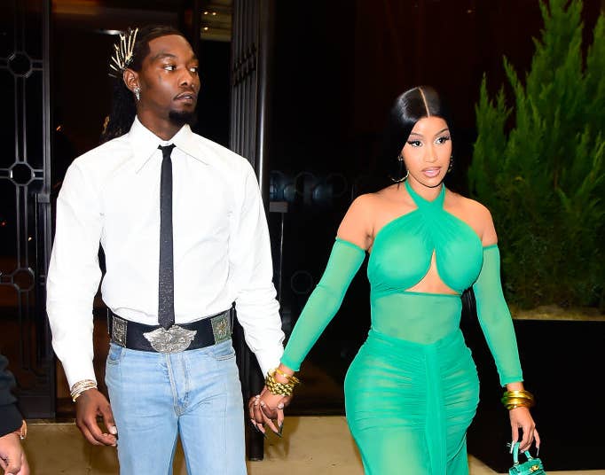 Cardi and Offset holding hands