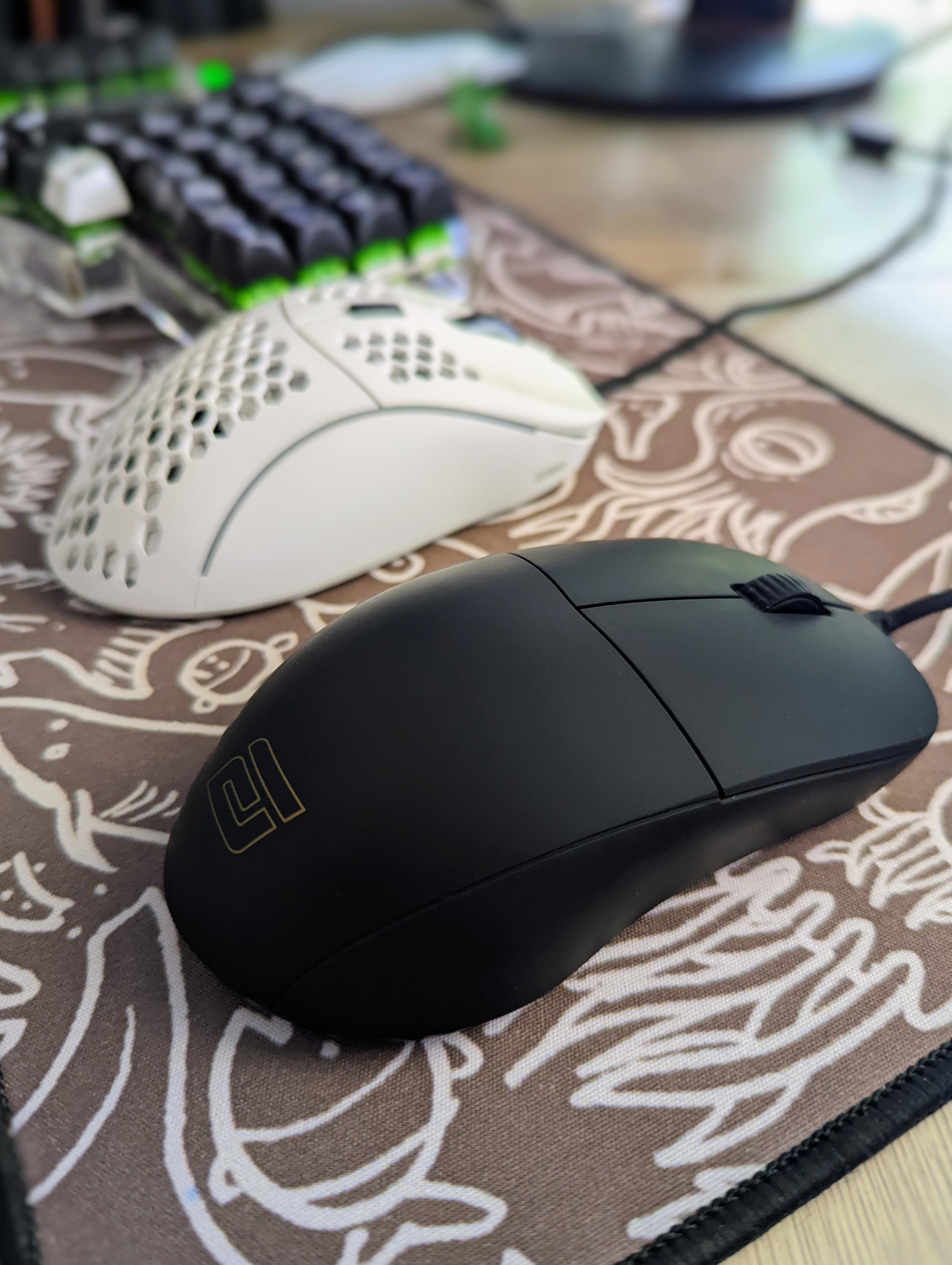 a wired mouse on a mousepad