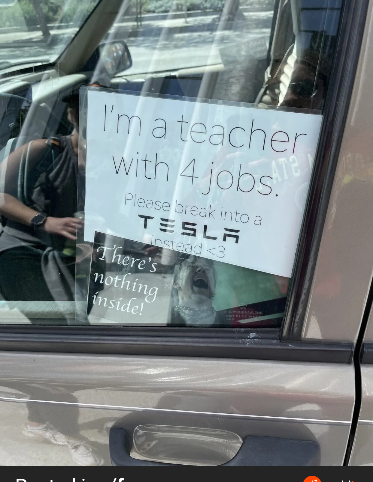 Sign in the car window: &quot;I&#x27;m a teacher with 4 jobs; please break into a Tesla instead &amp;lt;3 There&#x27;s nothing inside&quot;