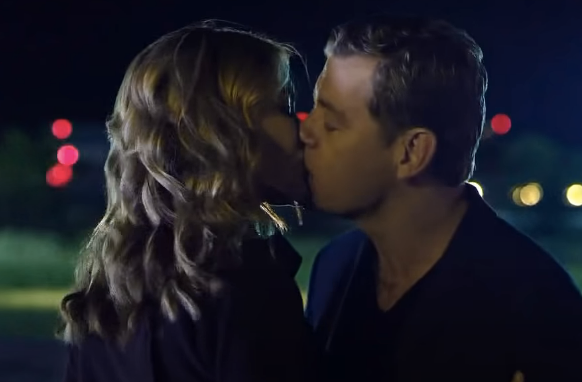 Close-up of Annie and Ryan kissing