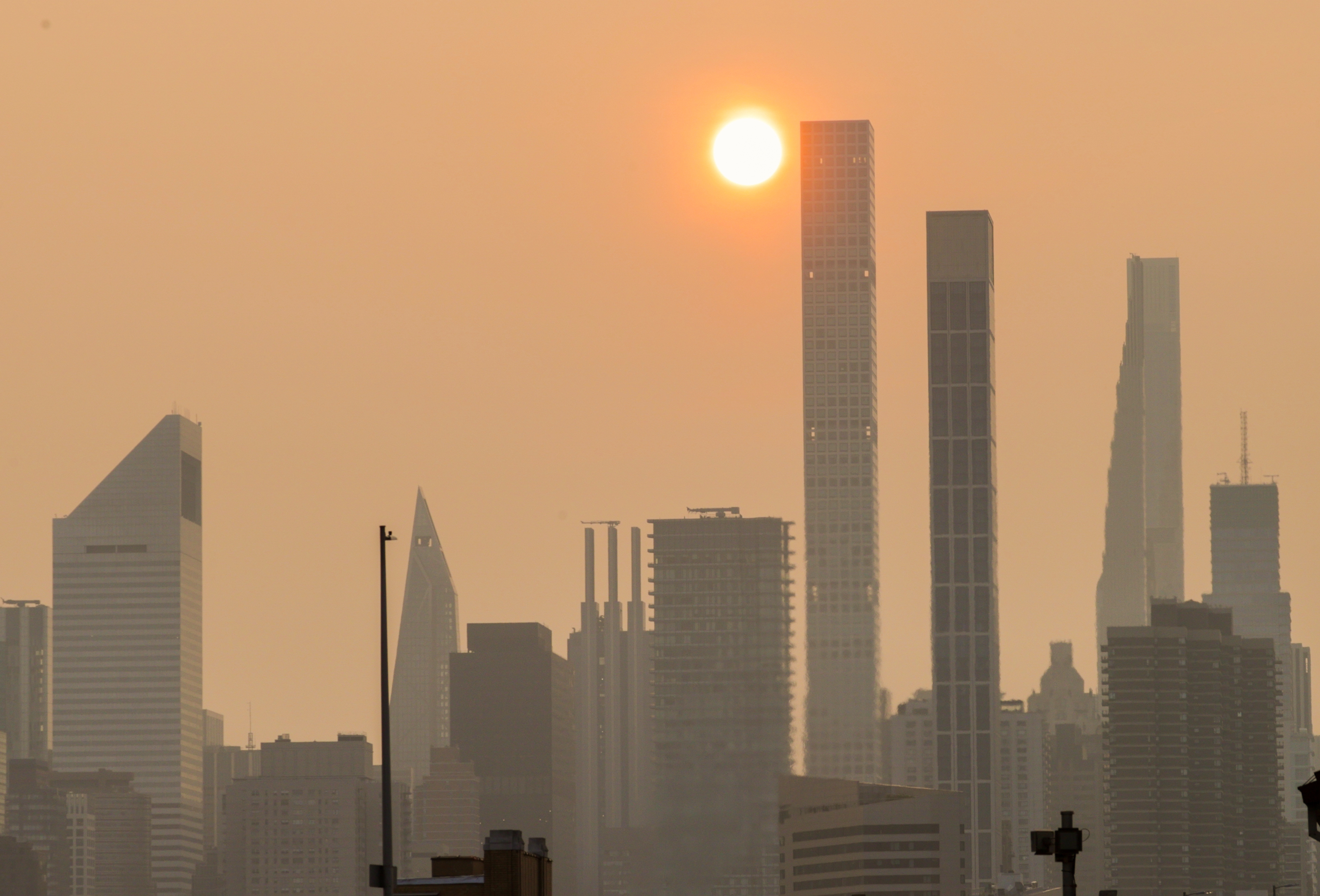 A view of the city as smoke from wildfires in Canada shrouds sky on June 30, 2023 in New York City, United States