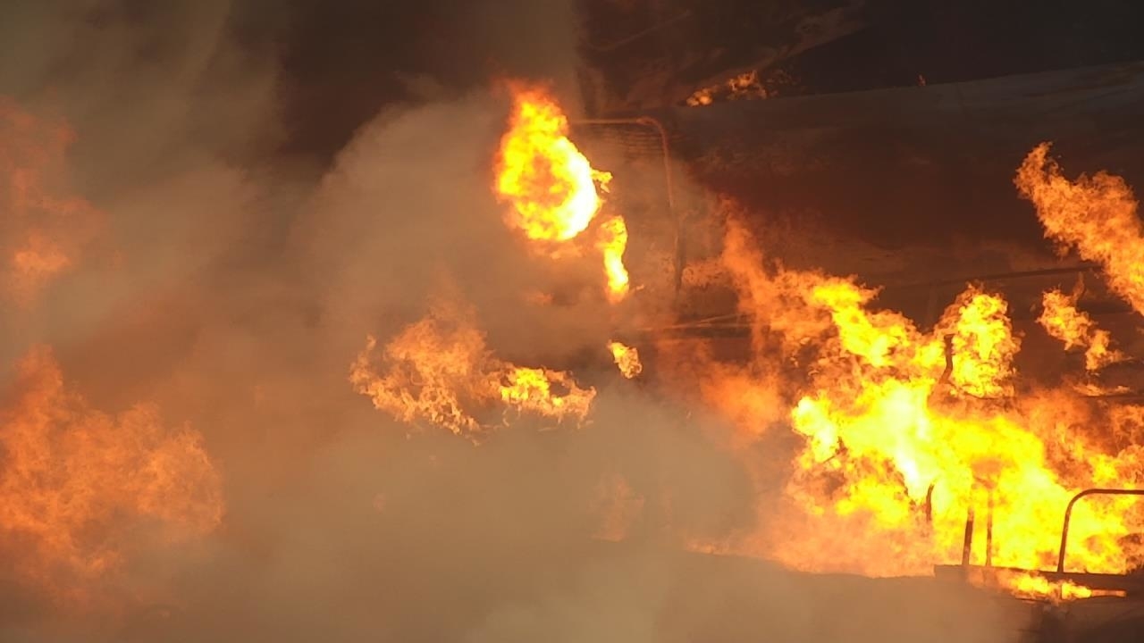 Smoke and flames rise after after the train derailment in East Palestine, Ohio