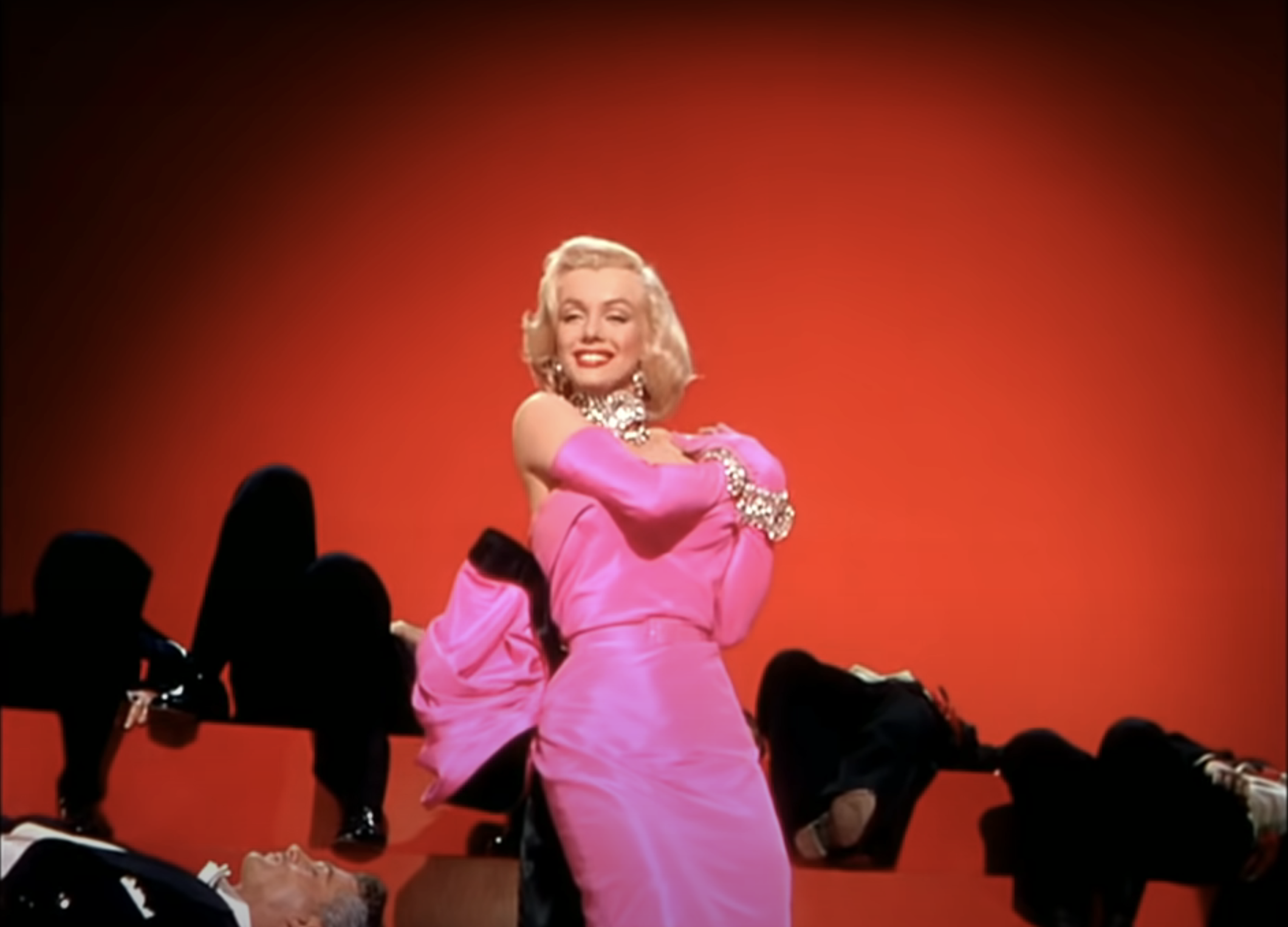 Marilyn Monroe singing &quot;diamonds are a girl&#x27;s best friend&quot; on a big soundstage, wearing a gorgeous dress and plenty of diamonds, in &quot;Gentlemen Prefer Blondes&quot; (1953)