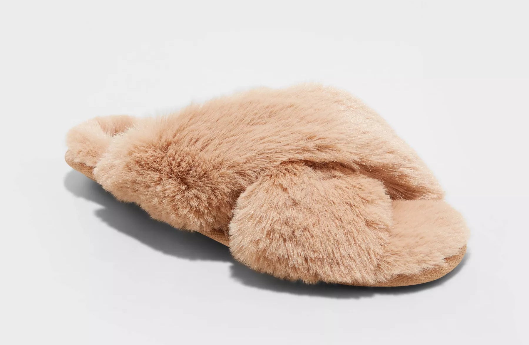 The crossband faux-fur slide slippers in a light camel color