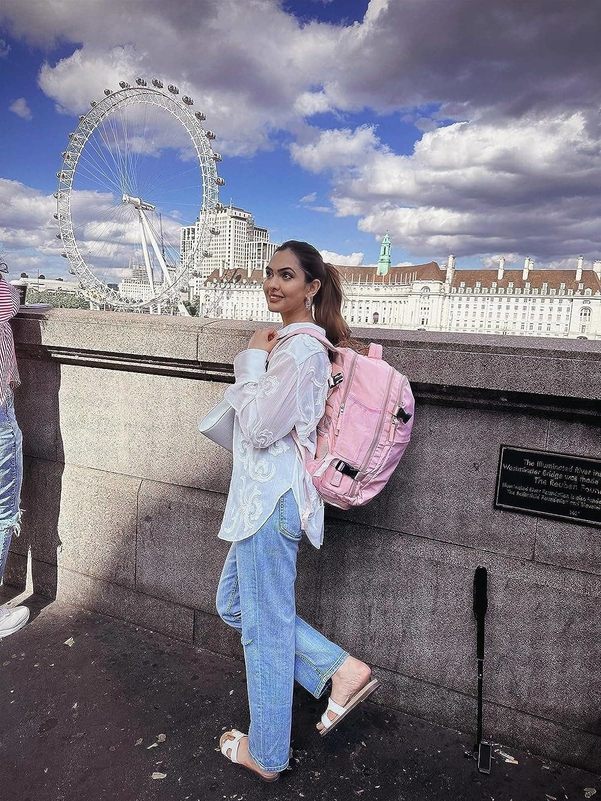 Reviewer wearing the pink backpack on a trip