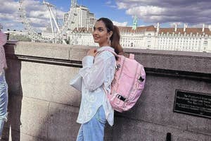 Reviewer wearing the pink backpack on a trip