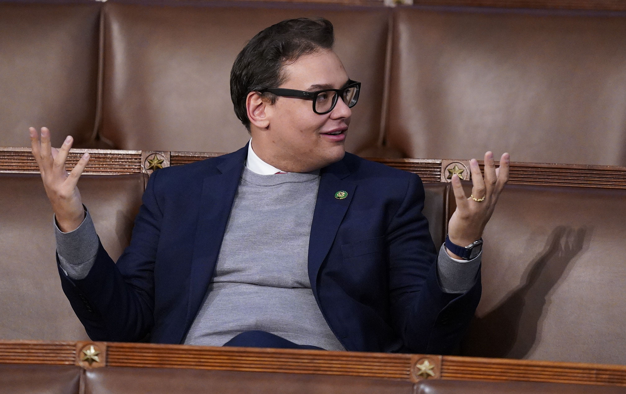 Closeup of George Santos sitting in Congress