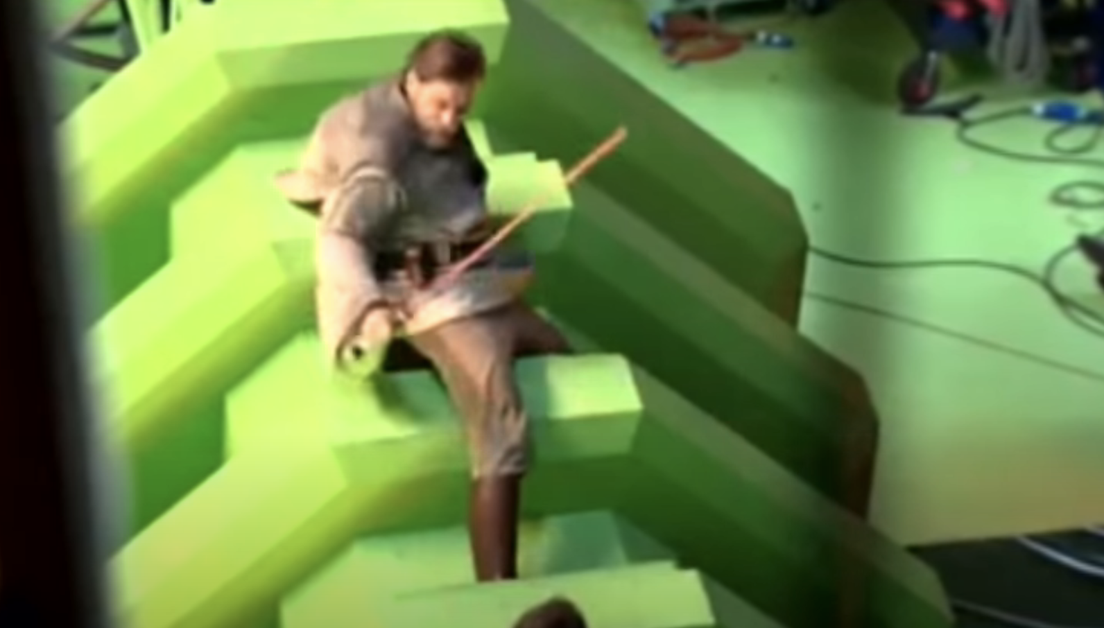 him climbing on green screen build-outs