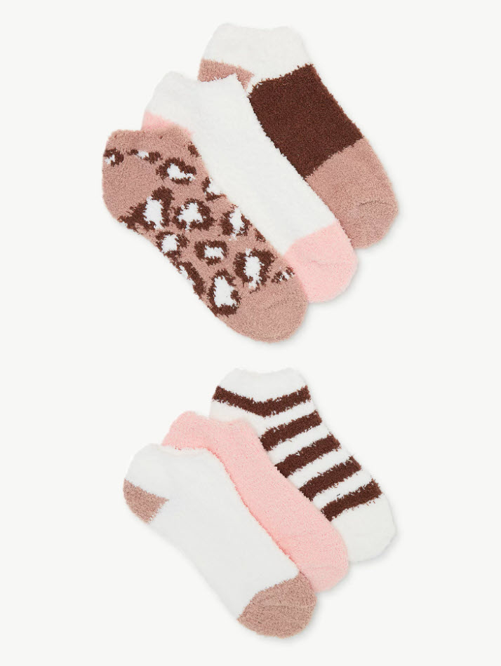 three pairs of fuzzy socks in various styles and colors