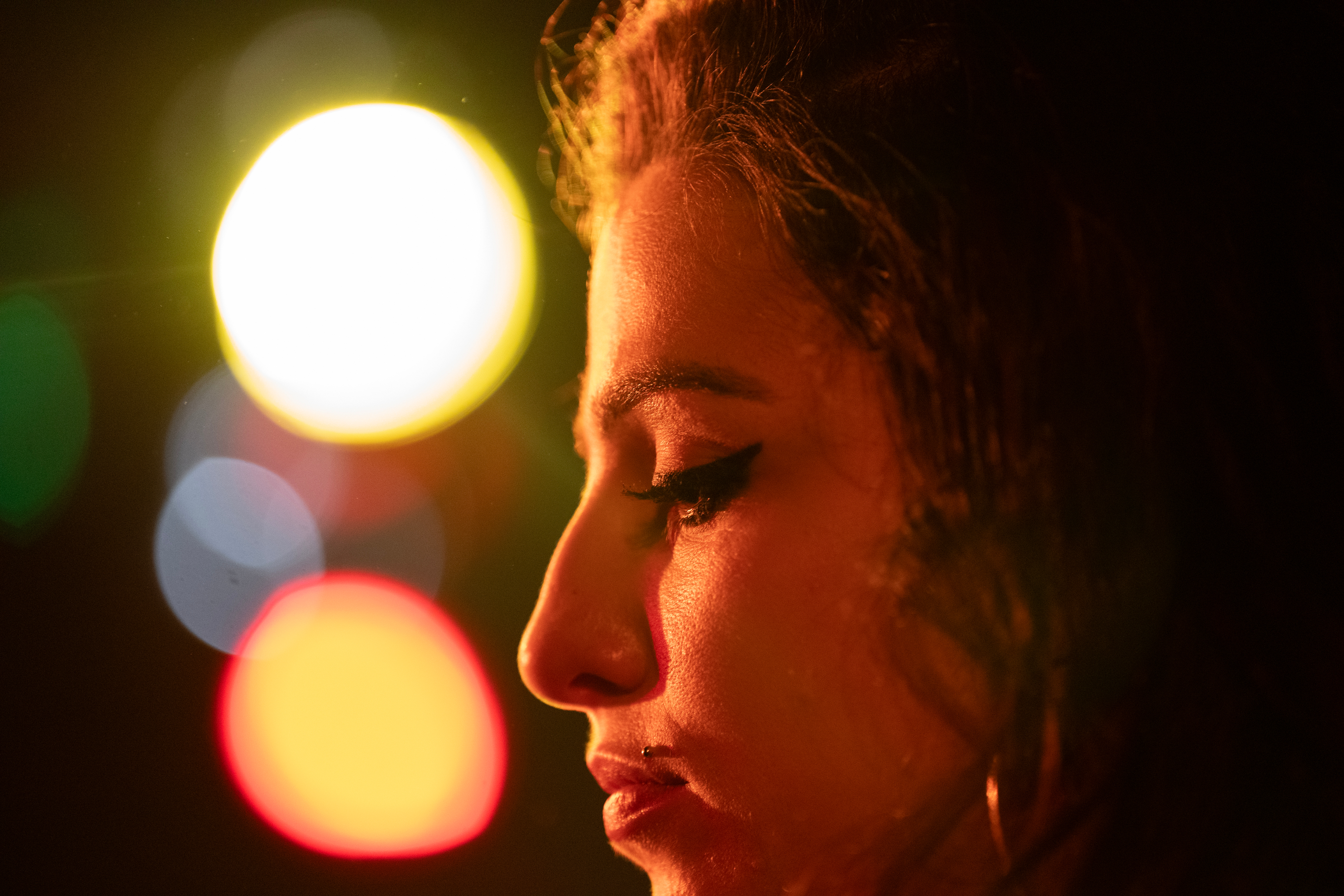 Closeup of Marisa Abela as Amy Winehouse