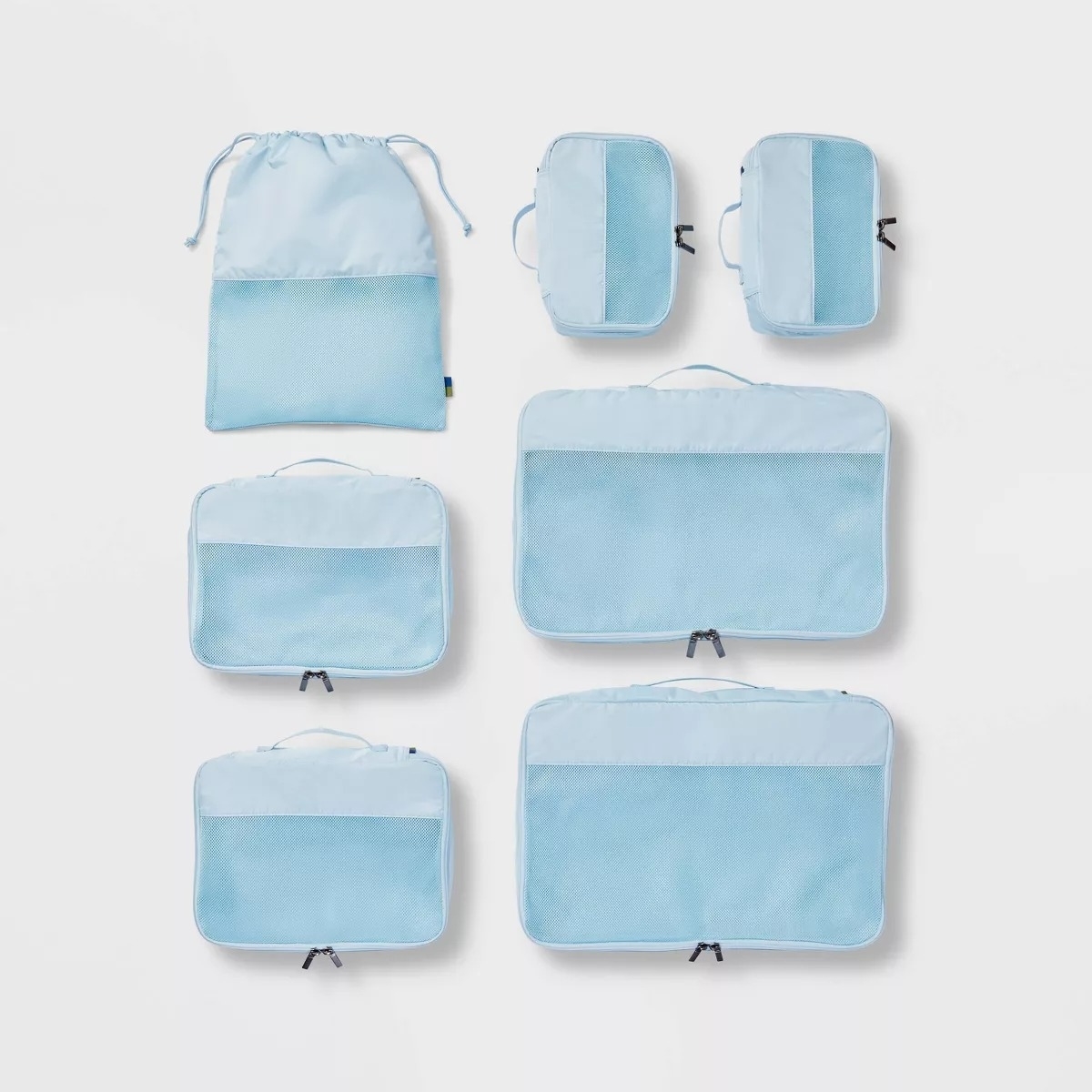 seven piece set of blue packing cubes