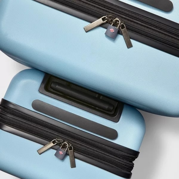 padlocks on two luggages