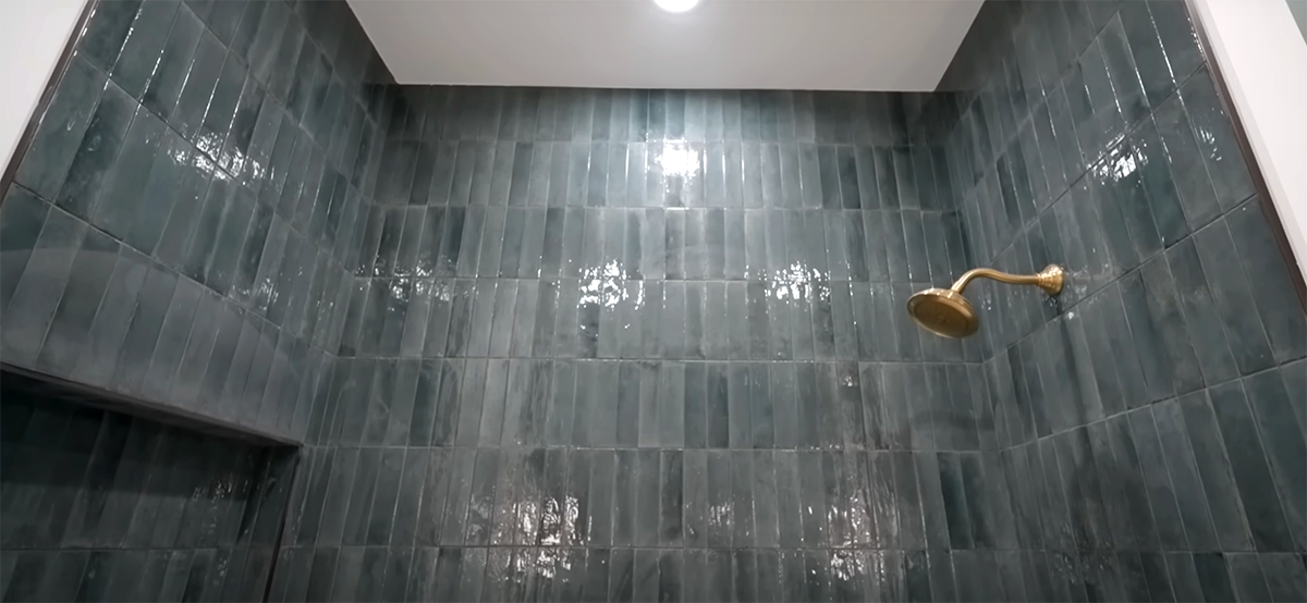 long aquamarine tile in a shower