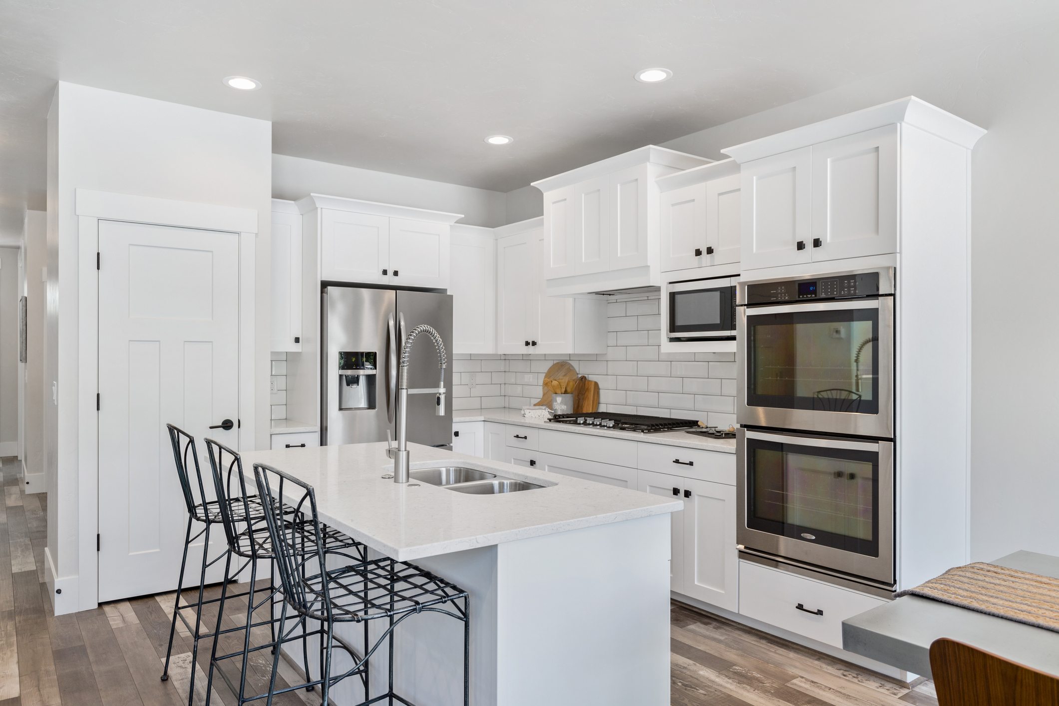 granite countertops and cabints in a kitchen are white