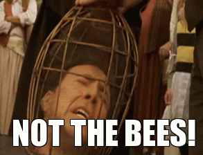 Nicolas Cage with his head in a cage, yelling, &quot;Not the bees!&quot;