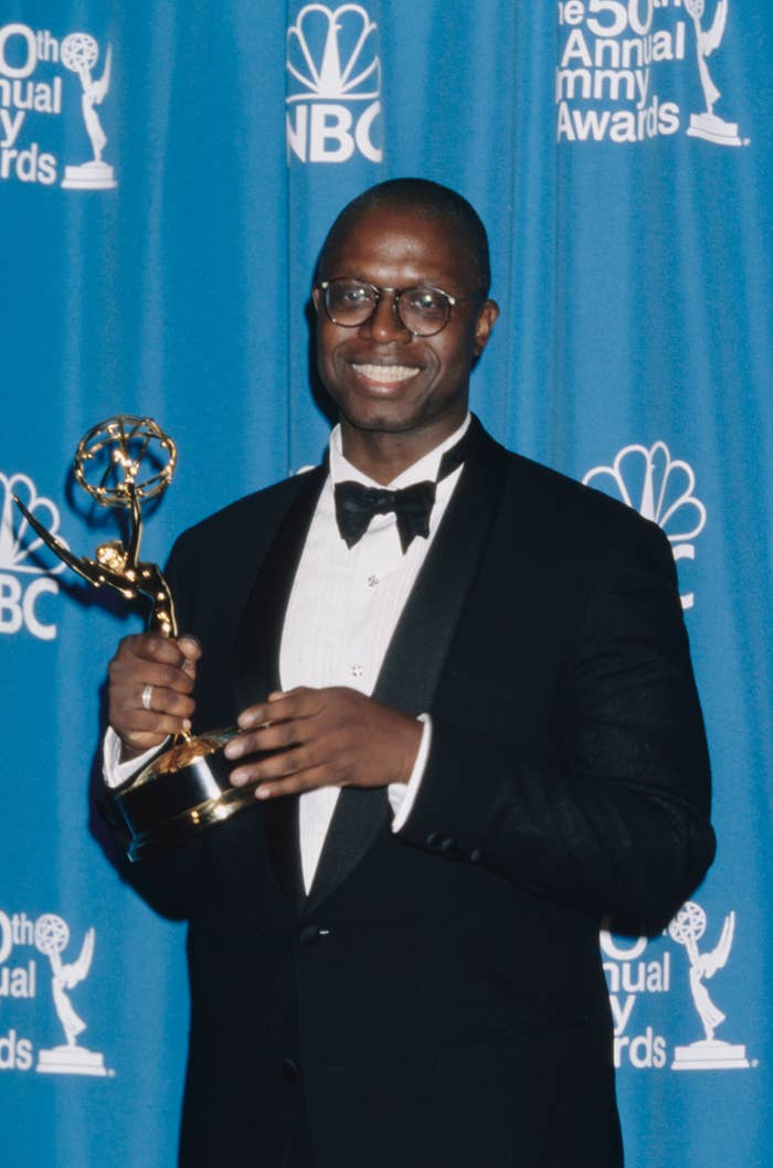 Andre Braugher holding his Emmy