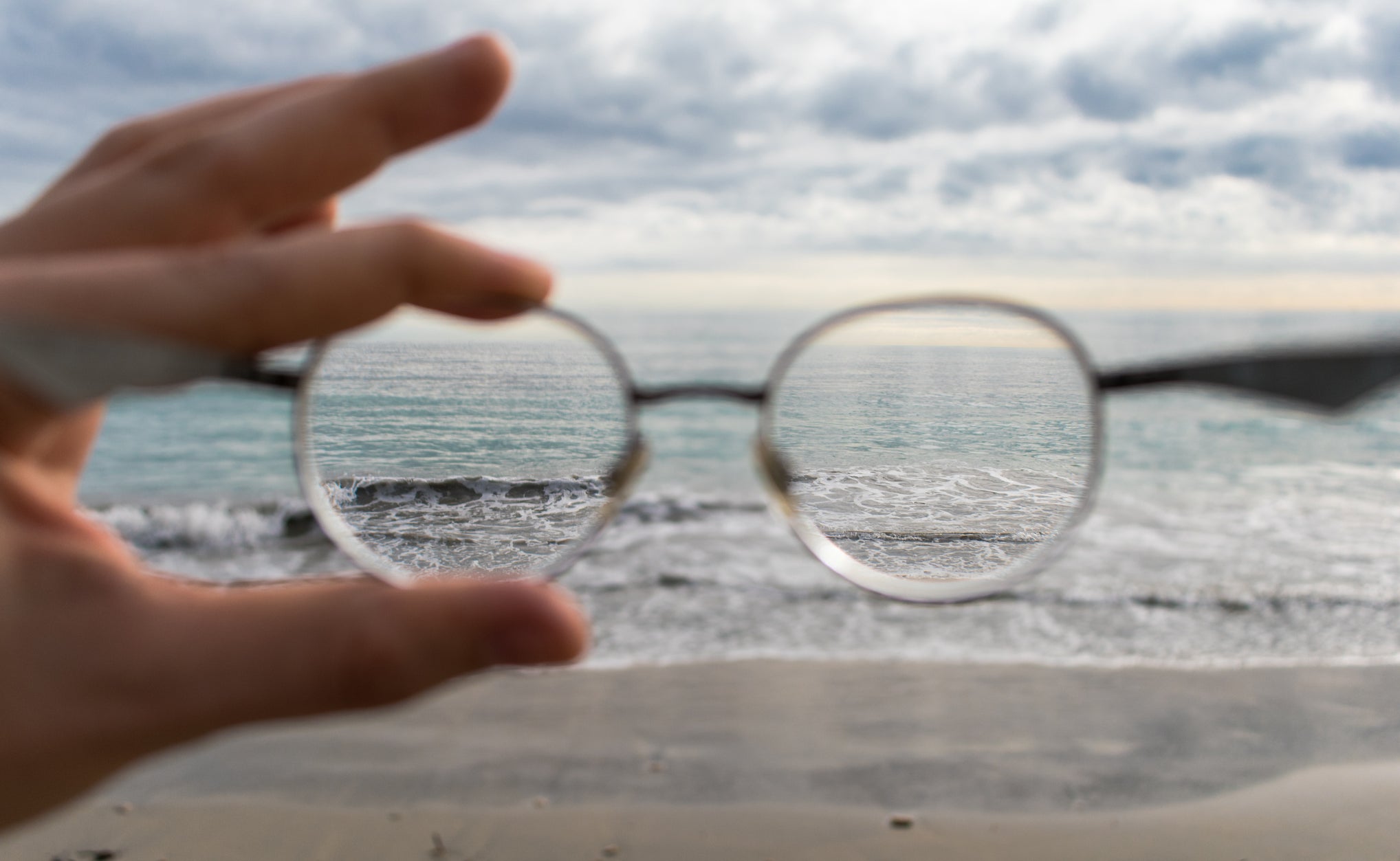 glasses looking at the ocean