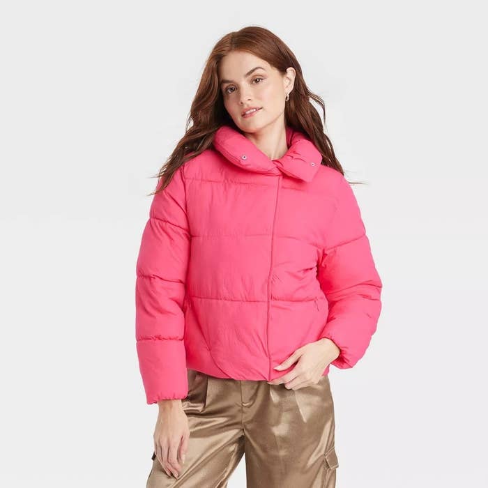 pink puffer jacket on model