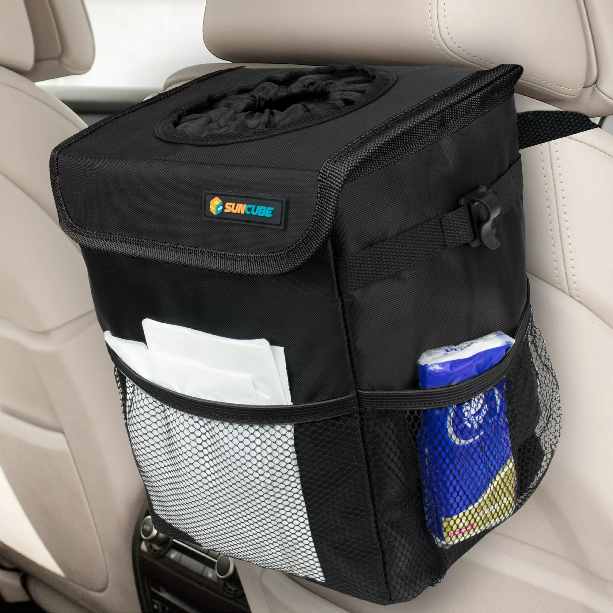 Black soft waste bin attached to back of passenger seat
